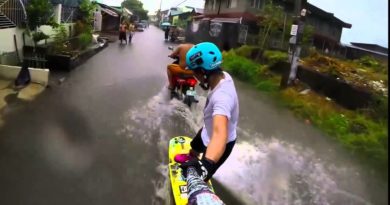 Die Philippinen im Video - Wakeboarding auf einer überschwemmten Strasse irgendwo in einem Dorf in den Philippinen